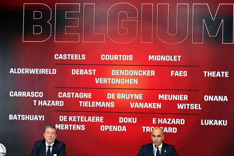 Red Devils' head coach Roberto Martinez (R) speaks during a press conference to present the squad of Belgium's national football team for the upcoming FIFA 2022 Qatar World Cup, at the Red Devils Base camp in Tubize, on November 10, 2022. (Photo by JOHN THYS / AFP)