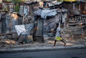 Man walking in downtown Port-au-Prince, Haiti