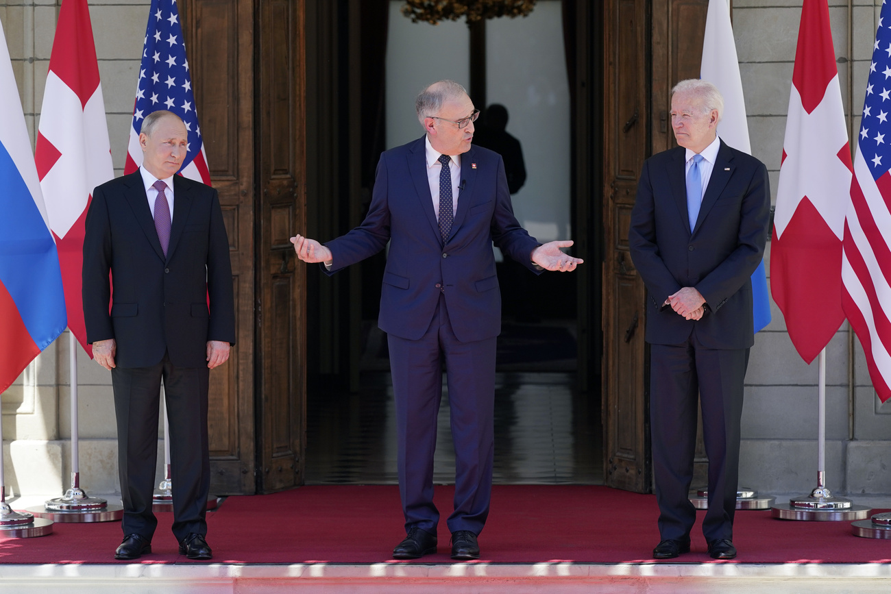 Le président de la Confédération entre le président russe et le président américain