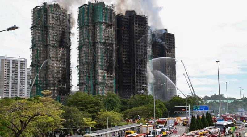 Chine : 55 morts, 300 disparus dans l'incendie de Hong Kong