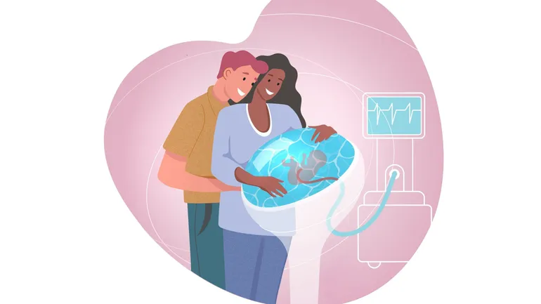 Des parents à côté du dispositif imaginé par Aquawomb